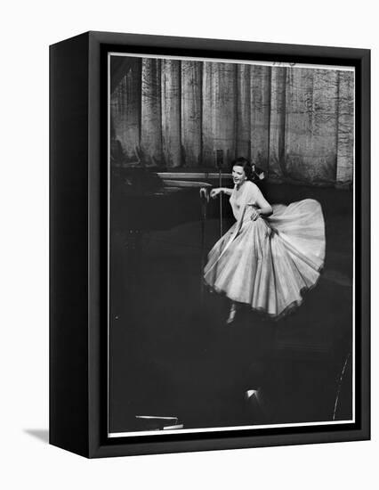 Actress and Singer Judy Garland Twirling Into a Dance Step During a Performance at the Palladium-Cornell Capa-Framed Premier Image Canvas