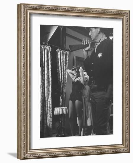 Actress Angie Dickinson During Dress Rehearsal of "Rio Bravo" with Actor John Wayne-Allan Grant-Framed Premium Photographic Print