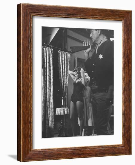 Actress Angie Dickinson During Dress Rehearsal of "Rio Bravo" with Actor John Wayne-Allan Grant-Framed Premium Photographic Print