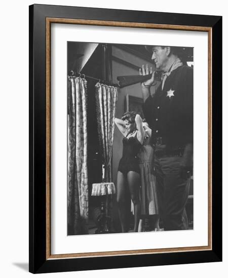 Actress Angie Dickinson During Dress Rehearsal of "Rio Bravo" with Actor John Wayne-Allan Grant-Framed Premium Photographic Print