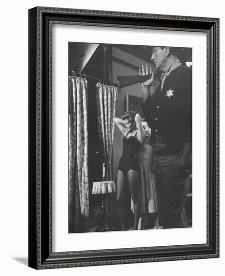 Actress Angie Dickinson During Dress Rehearsal of "Rio Bravo" with Actor John Wayne-Allan Grant-Framed Premium Photographic Print