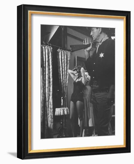 Actress Angie Dickinson During Dress Rehearsal of "Rio Bravo" with Actor John Wayne-Allan Grant-Framed Premium Photographic Print