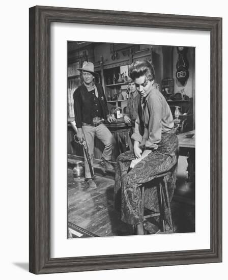 Actress Angie Dickinson on Set for "Rio Bravo" with Actor John Wayne-Allan Grant-Framed Premium Photographic Print