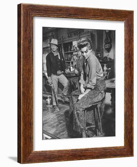 Actress Angie Dickinson on Set for "Rio Bravo" with Actor John Wayne-Allan Grant-Framed Premium Photographic Print