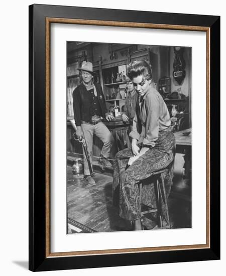 Actress Angie Dickinson on Set for "Rio Bravo" with Actor John Wayne-Allan Grant-Framed Premium Photographic Print