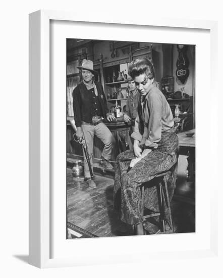 Actress Angie Dickinson on Set for "Rio Bravo" with Actor John Wayne-Allan Grant-Framed Premium Photographic Print