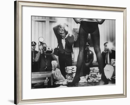 Actress Angie Dickinson's Lower Half Straddling a Million Dollars in Fake Money-John Dominis-Framed Premium Photographic Print