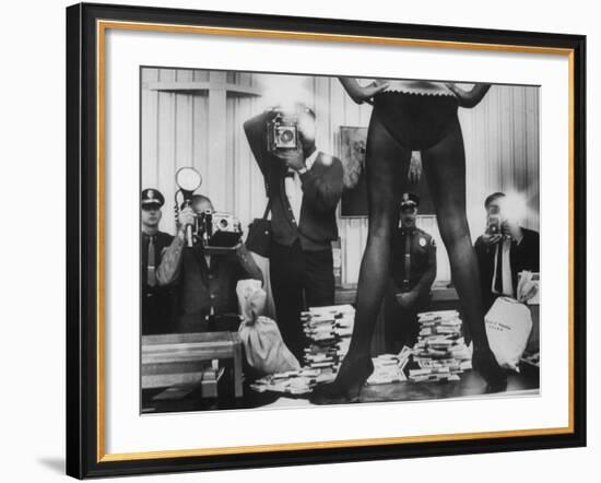 Actress Angie Dickinson's Lower Half Straddling a Million Dollars in Fake Money-John Dominis-Framed Premium Photographic Print