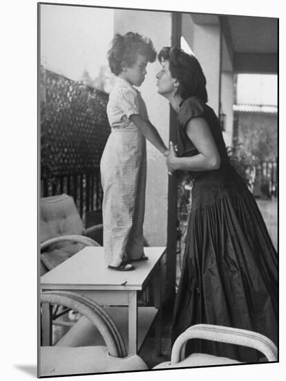 Actress Anna Magnani Posing with Child Standing on Table-null-Mounted Premium Photographic Print