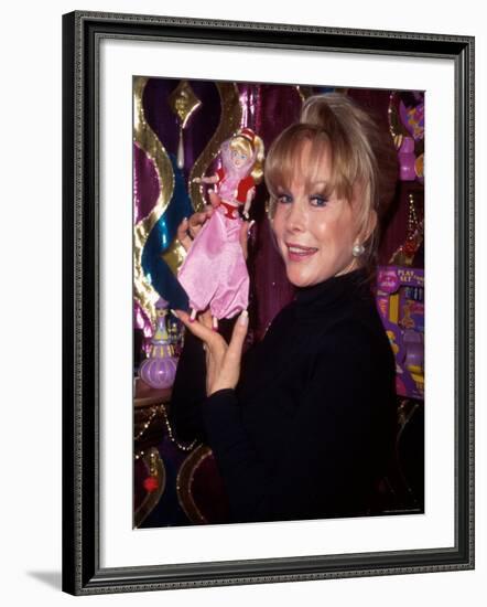 Actress Barbara Eden Holding Up Jeannie Doll-Dave Allocca-Framed Premium Photographic Print