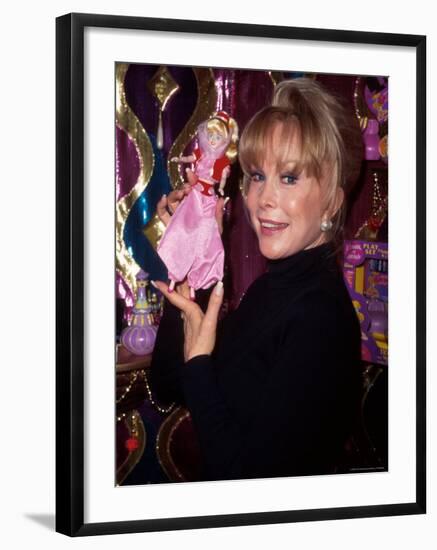 Actress Barbara Eden Holding Up Jeannie Doll-Dave Allocca-Framed Premium Photographic Print