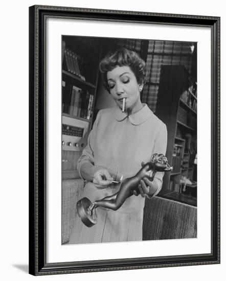 Actress Claudette Colbert in a Scene from "The Marriage-Go-Round"-Ralph Morse-Framed Premium Photographic Print