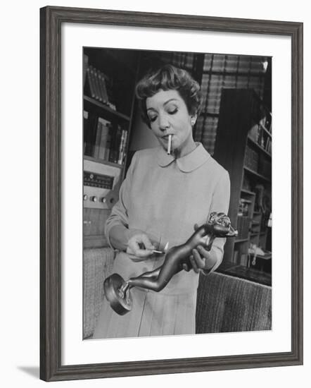 Actress Claudette Colbert in a Scene from "The Marriage-Go-Round"-Ralph Morse-Framed Premium Photographic Print