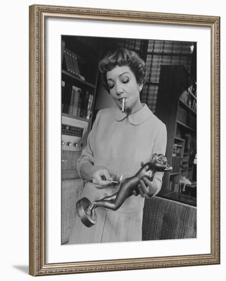 Actress Claudette Colbert in a Scene from "The Marriage-Go-Round"-Ralph Morse-Framed Premium Photographic Print