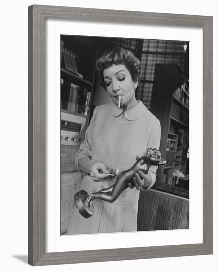 Actress Claudette Colbert in a Scene from "The Marriage-Go-Round"-Ralph Morse-Framed Premium Photographic Print