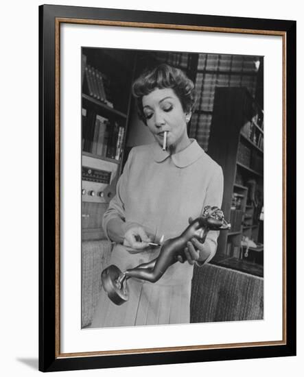 Actress Claudette Colbert in a Scene from "The Marriage-Go-Round"-Ralph Morse-Framed Premium Photographic Print