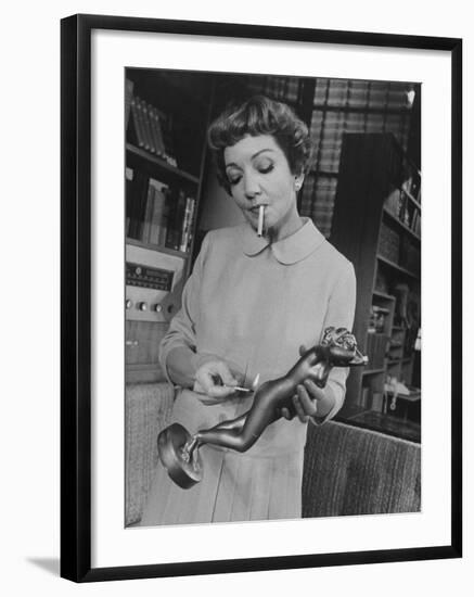 Actress Claudette Colbert in a Scene from "The Marriage-Go-Round"-Ralph Morse-Framed Premium Photographic Print