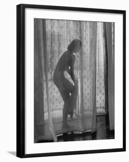 Actress Cyd Charisse in a Scene from the Movie, "Silk Stockings"-Allan Grant-Framed Premium Photographic Print