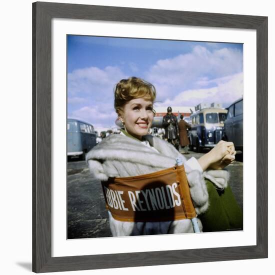 Actress Debbie Reynolds at Airport During Filming of "It Started with a Kiss"-Loomis Dean-Framed Premium Photographic Print