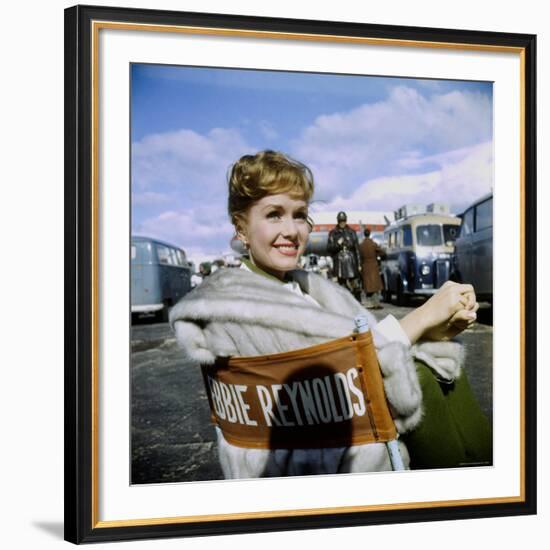 Actress Debbie Reynolds at Airport During Filming of "It Started with a Kiss"-Loomis Dean-Framed Premium Photographic Print