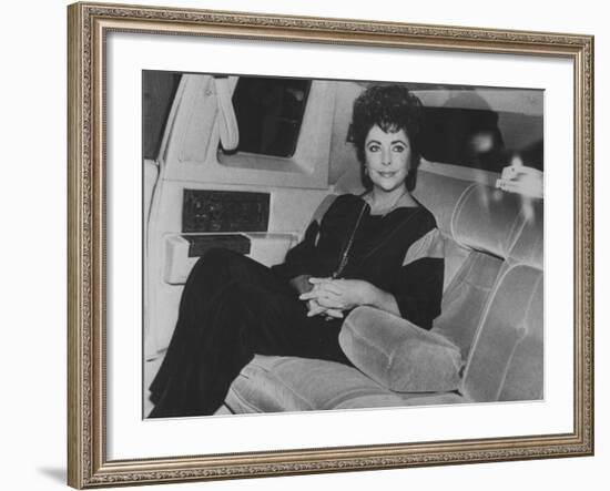 Actress Elizabeth Taylor Sitting in the Back of a Limo-David Mcgough-Framed Premium Photographic Print