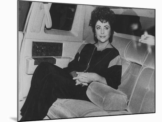 Actress Elizabeth Taylor Sitting in the Back of a Limo-David Mcgough-Mounted Premium Photographic Print