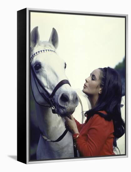 Actress Elizabeth Taylor with Horse During Filming of "Reflections in a Golden Eye"-Loomis Dean-Framed Premier Image Canvas