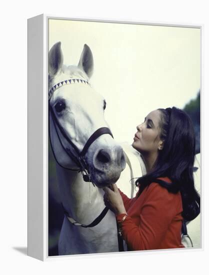 Actress Elizabeth Taylor with Horse During Filming of "Reflections in a Golden Eye"-Loomis Dean-Framed Premier Image Canvas