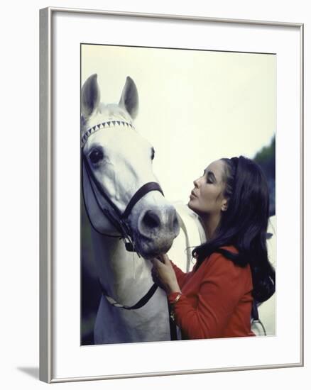 Actress Elizabeth Taylor with Horse During Filming of "Reflections in a Golden Eye"-Loomis Dean-Framed Premium Photographic Print