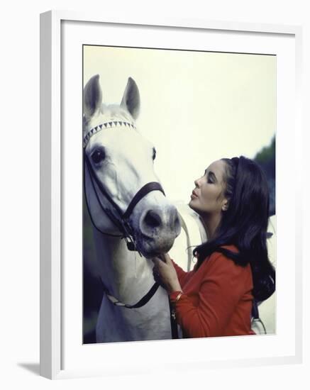 Actress Elizabeth Taylor with Horse During Filming of "Reflections in a Golden Eye"-Loomis Dean-Framed Premium Photographic Print