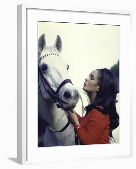 Actress Elizabeth Taylor with Horse During Filming of "Reflections in a Golden Eye"-Loomis Dean-Framed Premium Photographic Print