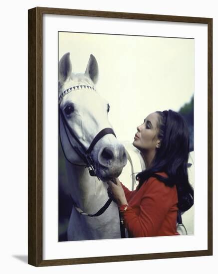 Actress Elizabeth Taylor with Horse During Filming of "Reflections in a Golden Eye"-Loomis Dean-Framed Premium Photographic Print