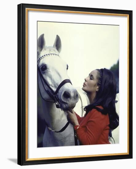 Actress Elizabeth Taylor with Horse During Filming of "Reflections in a Golden Eye"-Loomis Dean-Framed Premium Photographic Print