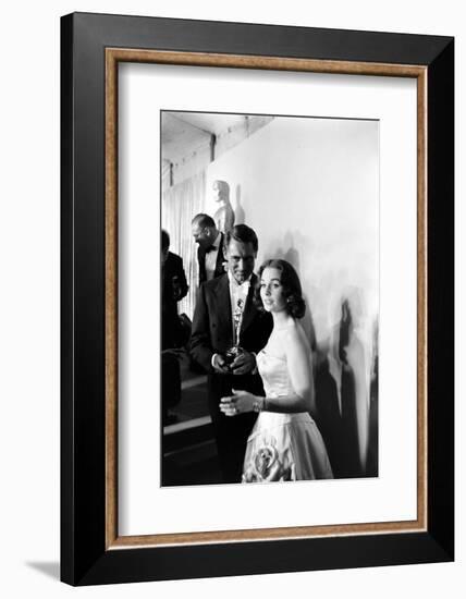 Actress Gene Simmons and Cary Grant Backstage at the 30th Academy Awards, 1958-Ralph Crane-Framed Photographic Print