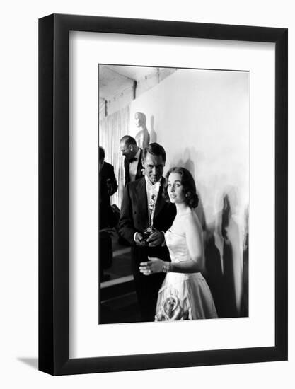 Actress Gene Simmons and Cary Grant Backstage at the 30th Academy Awards, 1958-Ralph Crane-Framed Photographic Print