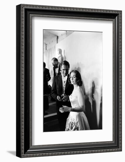 Actress Gene Simmons and Cary Grant Backstage at the 30th Academy Awards, 1958-Ralph Crane-Framed Photographic Print