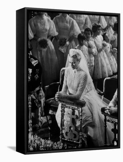 Actress Grace Kelly in Gorgeous Wedding Gown Praying During Her Wedding to Prince Rainier-Thomas D^ Mcavoy-Framed Premier Image Canvas