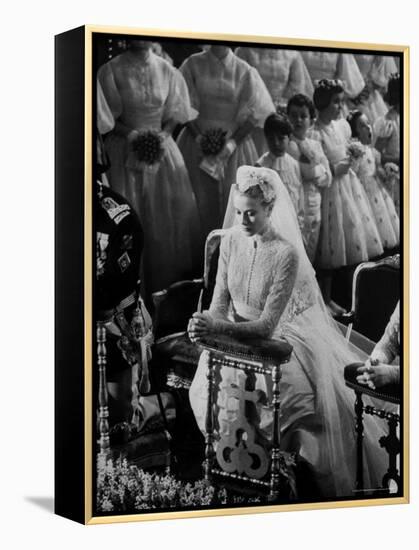 Actress Grace Kelly in Gorgeous Wedding Gown Praying During Her Wedding to Prince Rainier-Thomas D^ Mcavoy-Framed Premier Image Canvas
