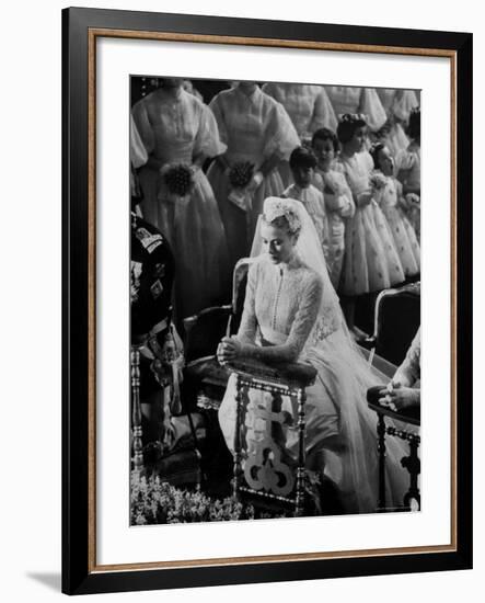 Actress Grace Kelly in Gorgeous Wedding Gown Praying During Her Wedding to Prince Rainier-Thomas D^ Mcavoy-Framed Premium Photographic Print