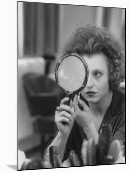 Actress Hanna Schygulla Looking in Hand Mirror While Applying Makeup-Alfred Eisenstaedt-Mounted Premium Photographic Print