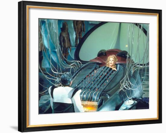 Actress Jane Fonda trapped in Machine which kills during scene from Roger Vadim's "Barbarella"-Carlo Bavagnoli-Framed Premium Photographic Print