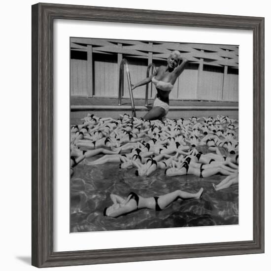 Actress Jayne Mansfield Posing with Shaped Hot Water Bottles Floating around Her at Her Pool-Allan Grant-Framed Premium Photographic Print