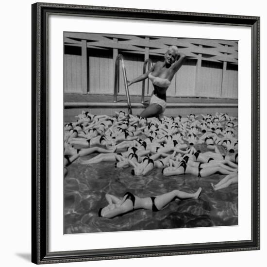 Actress Jayne Mansfield Posing with Shaped Hot Water Bottles Floating around Her at Her Pool-Allan Grant-Framed Premium Photographic Print