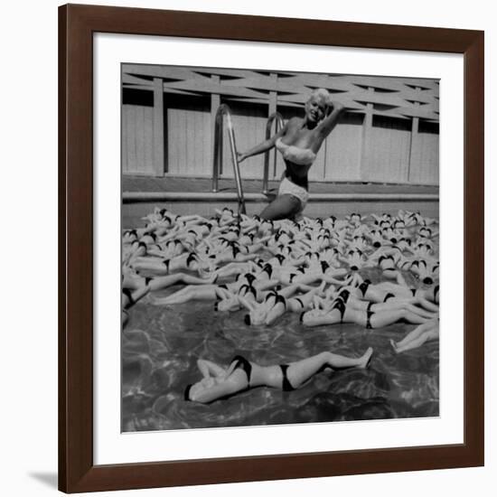 Actress Jayne Mansfield Posing with Shaped Hot Water Bottles Floating around Her at Her Pool-Allan Grant-Framed Premium Photographic Print