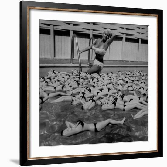 Actress Jayne Mansfield Posing with Shaped Hot Water Bottles Floating around Her at Her Pool-Allan Grant-Framed Premium Photographic Print