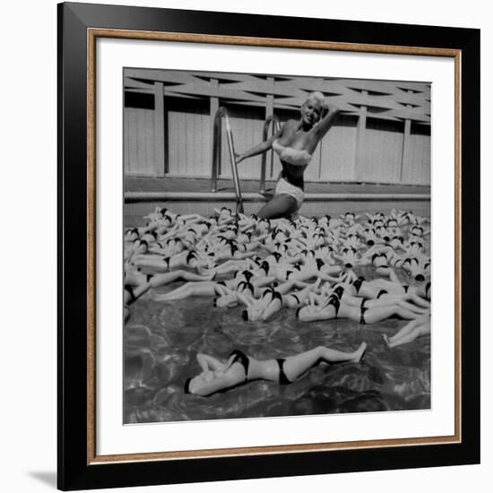 Actress Jayne Mansfield Posing with Shaped Hot Water Bottles Floating around Her at Her Pool-Allan Grant-Framed Premium Photographic Print