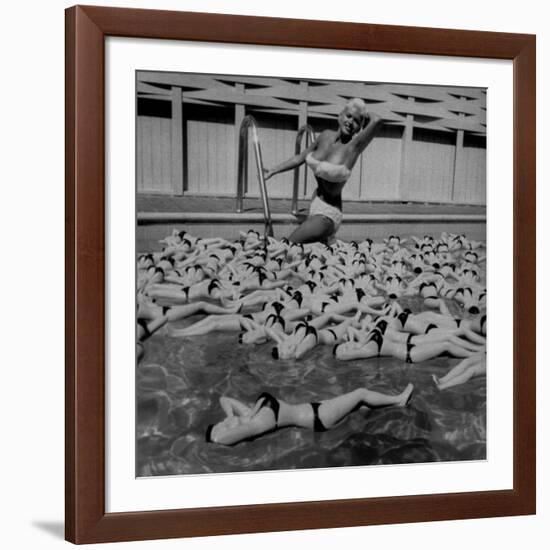 Actress Jayne Mansfield Posing with Shaped Hot Water Bottles Floating around Her at Her Pool-Allan Grant-Framed Premium Photographic Print