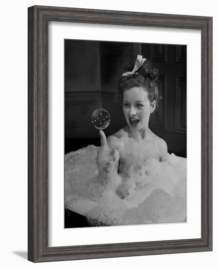 Actress Jeanne Crain Taking Bubble Bath for Her Role in Movie "Margie"-Peter Stackpole-Framed Premium Photographic Print