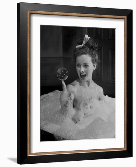 Actress Jeanne Crain Taking Bubble Bath for Her Role in Movie "Margie"-Peter Stackpole-Framed Premium Photographic Print