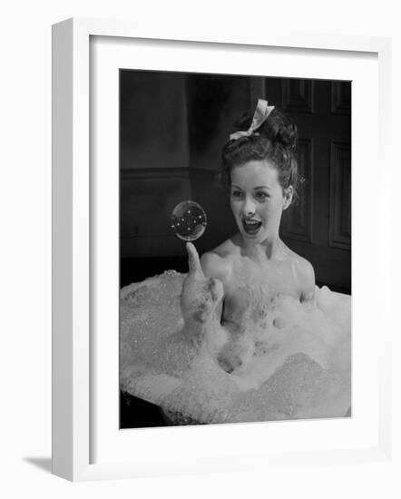 Actress Jeanne Crain Taking Bubble Bath for Her Role in Movie "Margie"-Peter Stackpole-Framed Premium Photographic Print